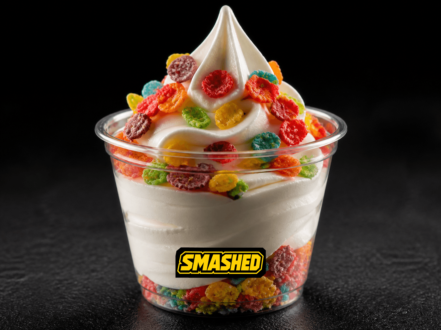 Fruity Pebbles soft serve in a branded clear cup